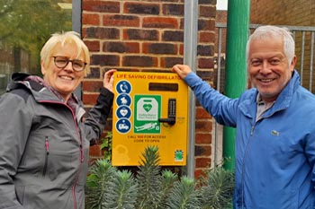 Lynn Timms of Forty 4 Frankie and Alan Jenkins of landport Community Centre